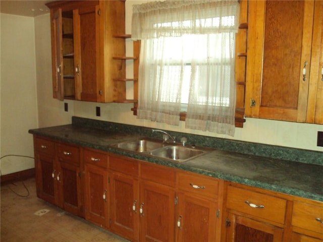 331 W Main, Somerset Boro, PA 15501 - kitchen with open shelves, brown cabinetry, and dark countertops
