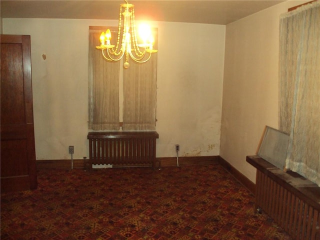 331 W Main, Somerset Boro, PA 15501 - unfurnished dining area with a chandelier and radiator heating unit