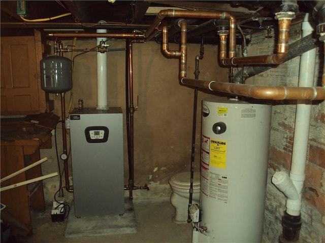 331 W Main, Somerset Boro, PA 15501 - utility room featuring gas water heater and a heating unit