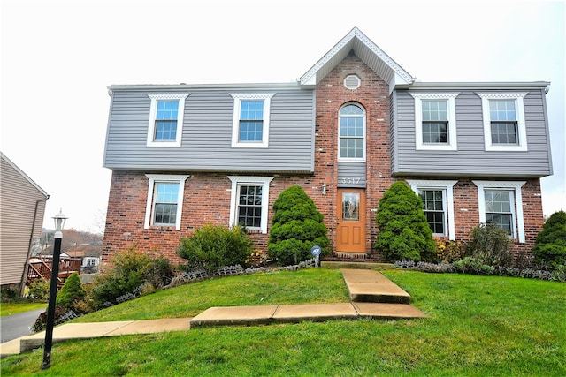 view of front of home featuring a front lawn