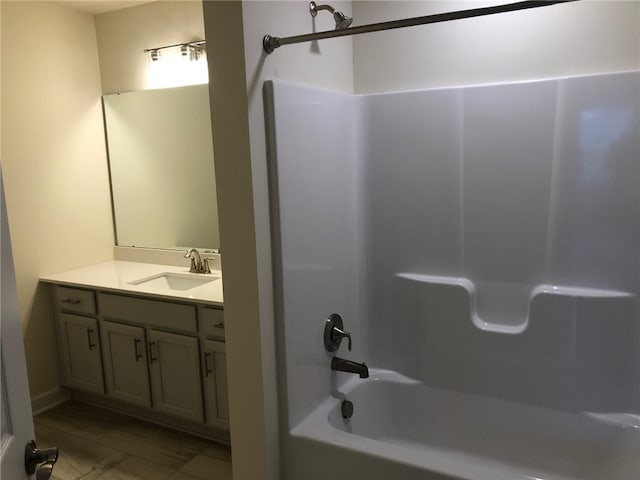 bathroom featuring vanity and bathtub / shower combination