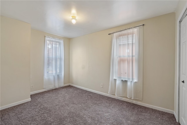 view of carpeted spare room