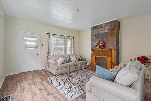 living room with light hardwood / wood-style floors