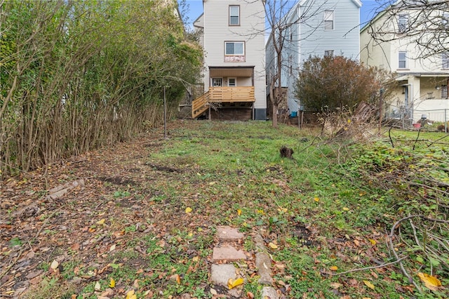 view of yard with a wooden deck