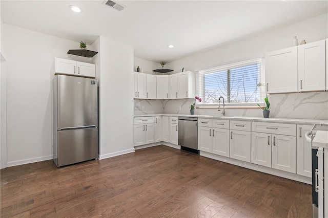 kitchen with white cabinets and stainless steel appliances