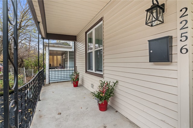 view of patio featuring a porch