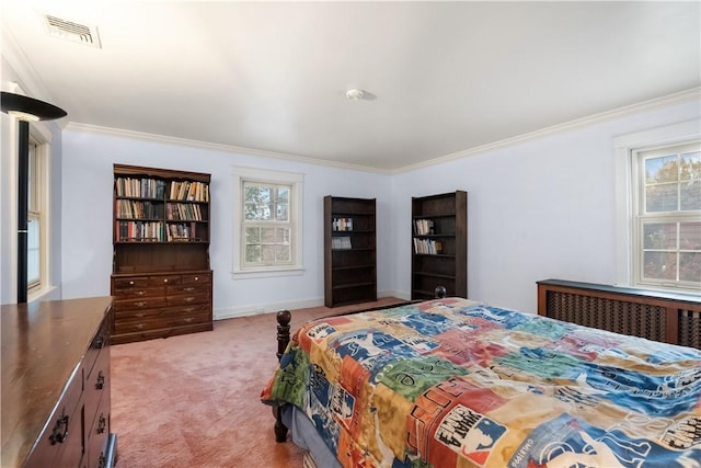 bedroom featuring light colored carpet, visible vents, crown molding, and radiator heating unit