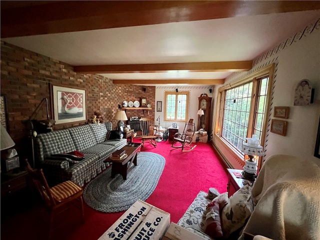 carpeted living room featuring beamed ceiling and brick wall