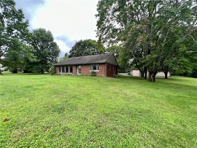 view of yard with a garage