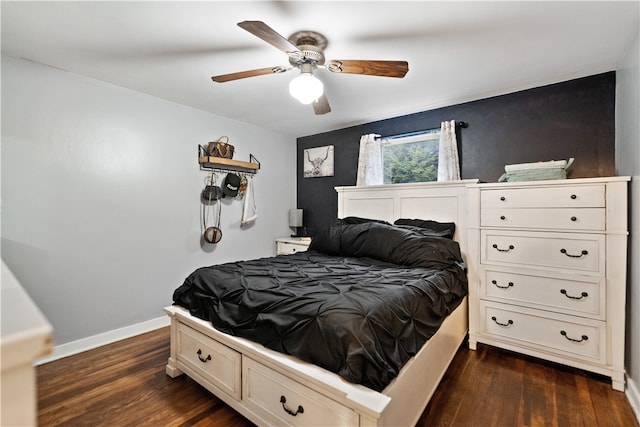 bedroom featuring dark hardwood / wood-style floors and ceiling fan