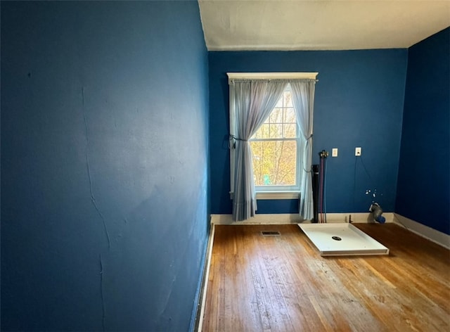 interior space with hardwood / wood-style flooring