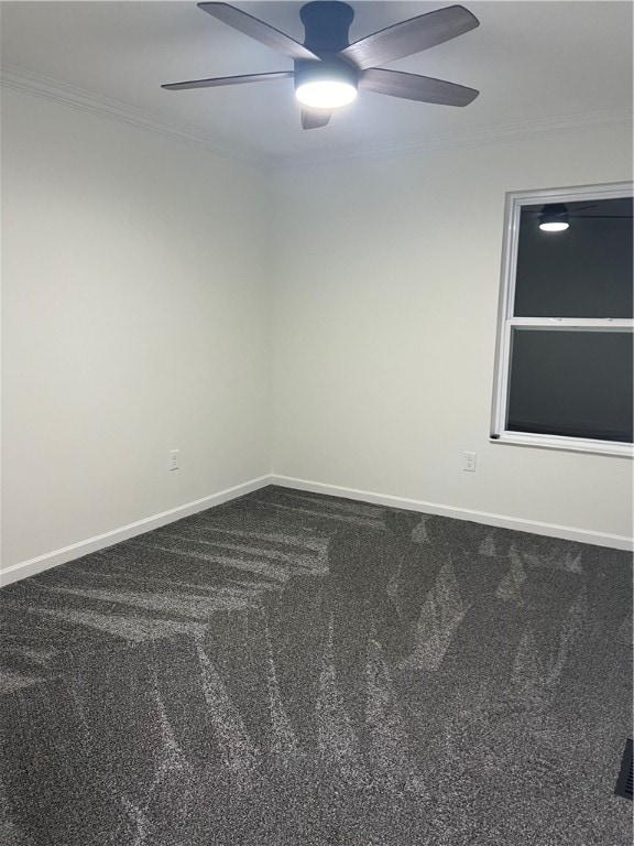 carpeted empty room featuring crown molding and ceiling fan