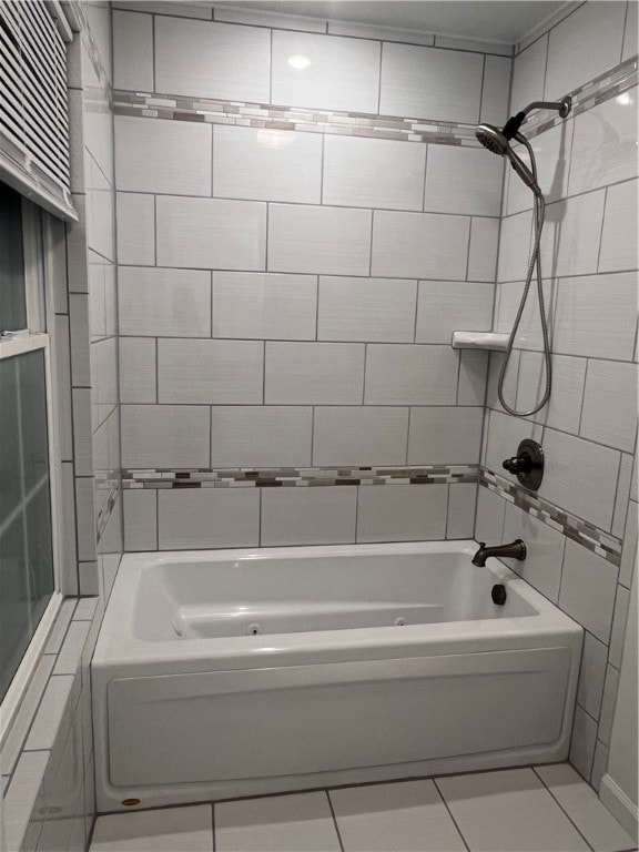 bathroom with tile patterned flooring and tiled shower / bath combo