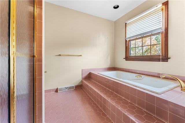 bathroom with tile patterned flooring