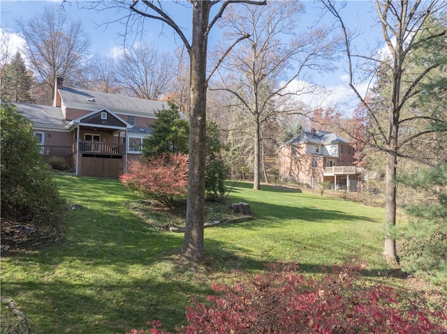 view of yard featuring a deck