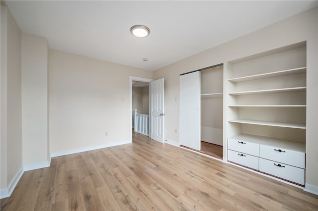 unfurnished bedroom featuring light hardwood / wood-style flooring