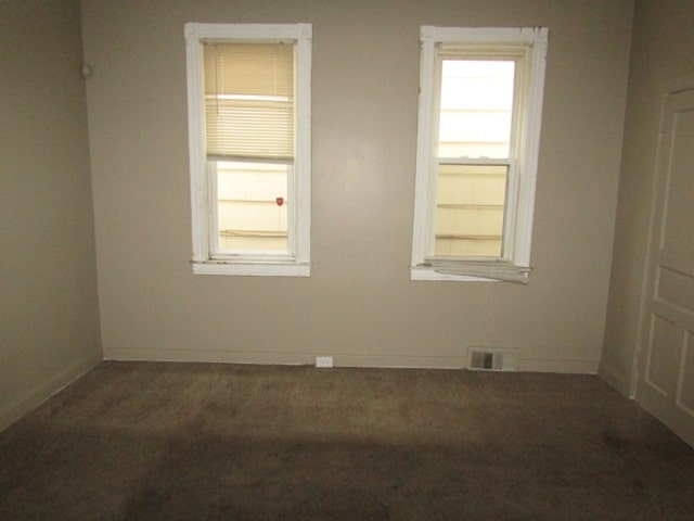 view of carpeted spare room