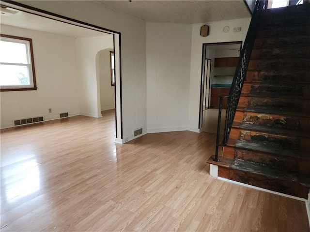 spare room with light hardwood / wood-style flooring