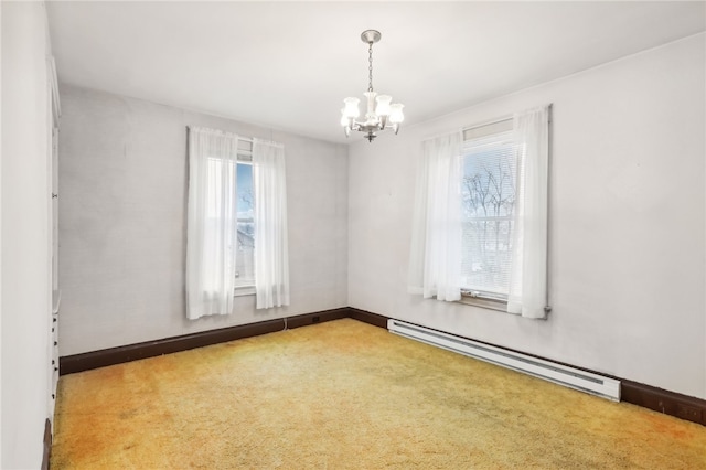 carpeted spare room featuring an inviting chandelier and a baseboard radiator