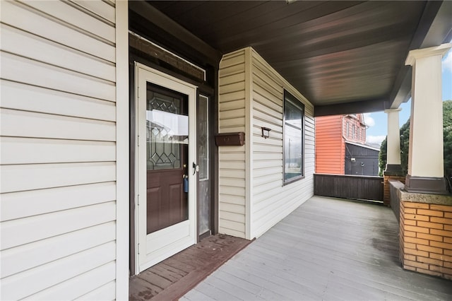 entrance to property with covered porch