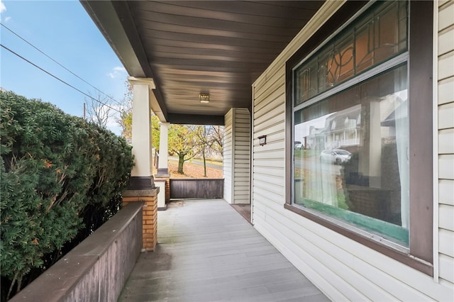 balcony featuring a porch