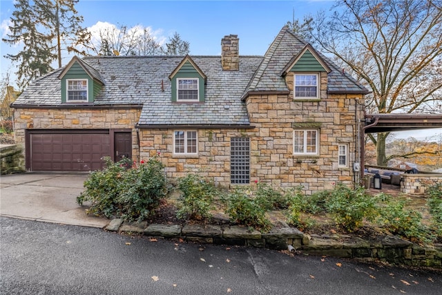 view of front of property with a garage