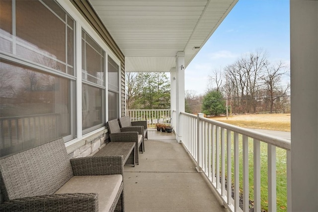 balcony featuring covered porch