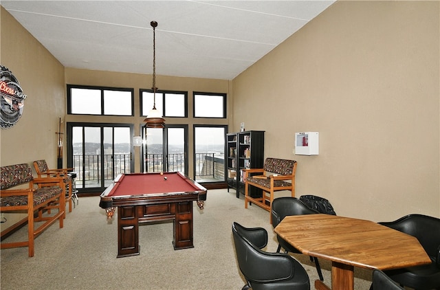 playroom featuring carpet floors, a high ceiling, and billiards