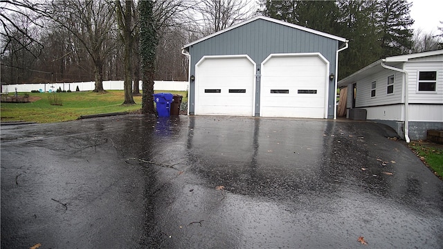 garage with a lawn