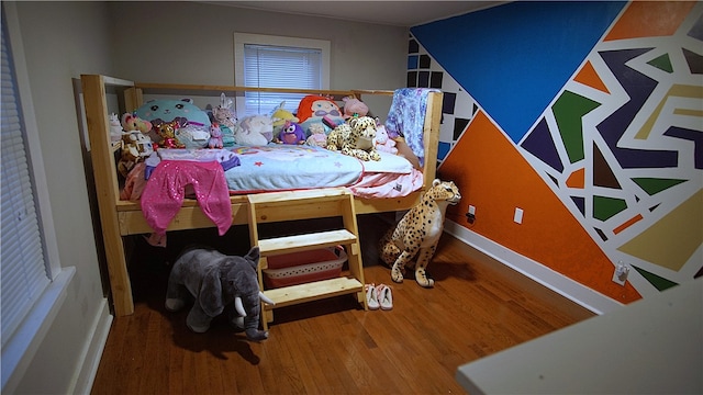 bedroom featuring hardwood / wood-style floors