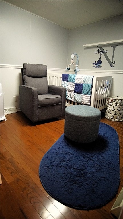 sitting room featuring hardwood / wood-style flooring