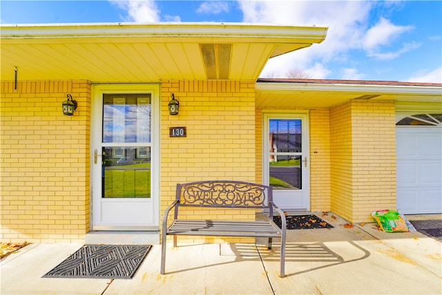 property entrance featuring a garage