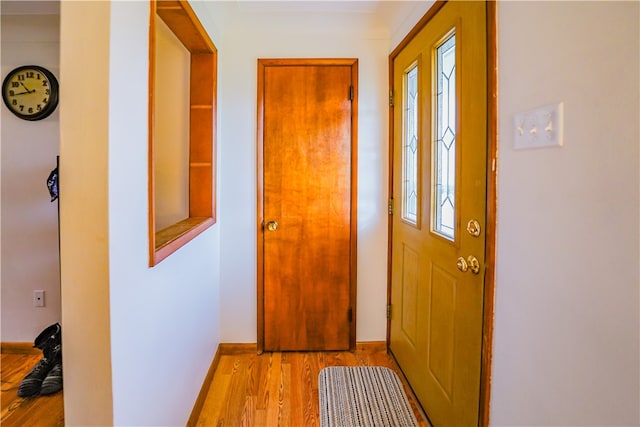 doorway to outside featuring light wood-type flooring