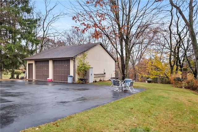 garage with a lawn