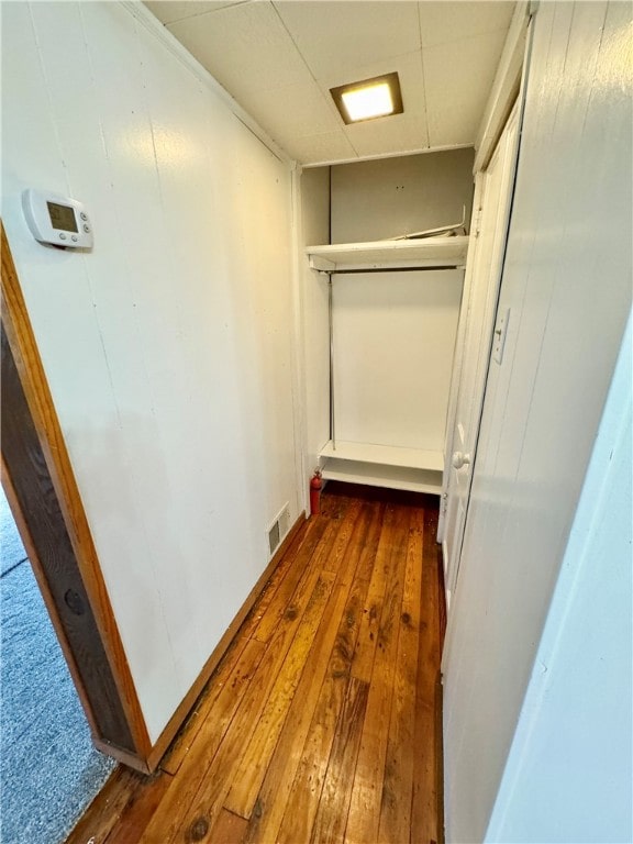 hall featuring dark wood-type flooring