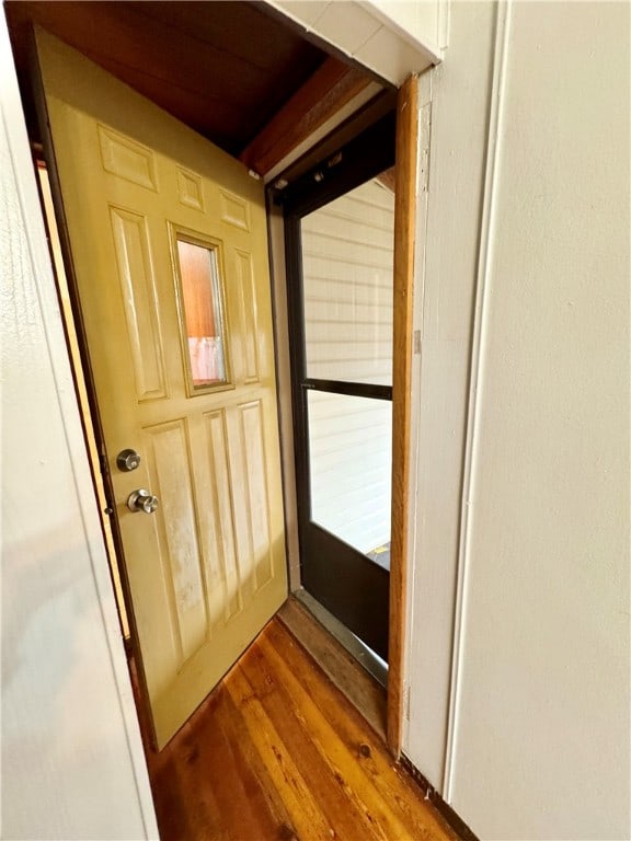 entryway with hardwood / wood-style floors