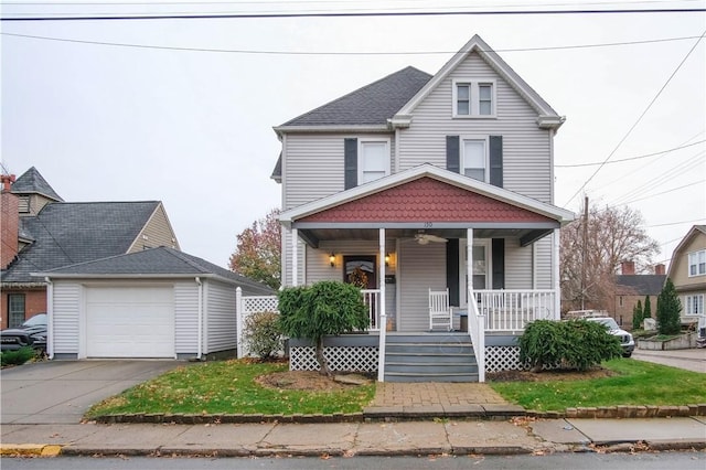 view of front facade with a garage and covered porch