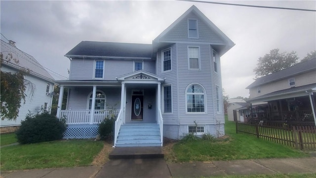 411 W 2nd Ave, Derry Twp, PA 15627 - victorian house featuring a porch