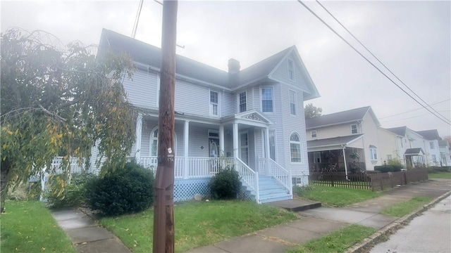 411 W 2nd Ave, Derry Twp, PA 15627 - victorian home featuring a porch