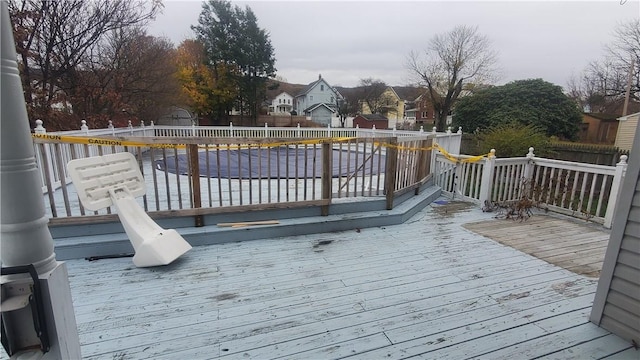 411 W 2nd Ave, Derry Twp, PA 15627 - wooden deck featuring a fenced backyard and a residential view