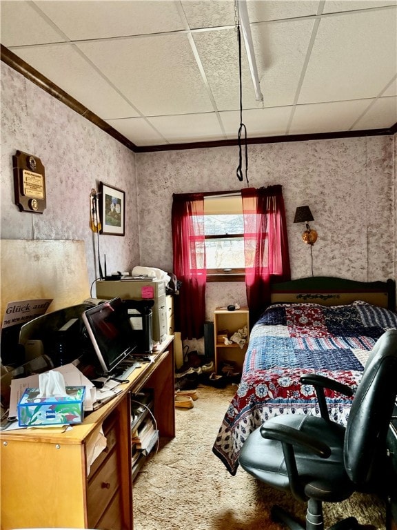 carpeted bedroom with a paneled ceiling