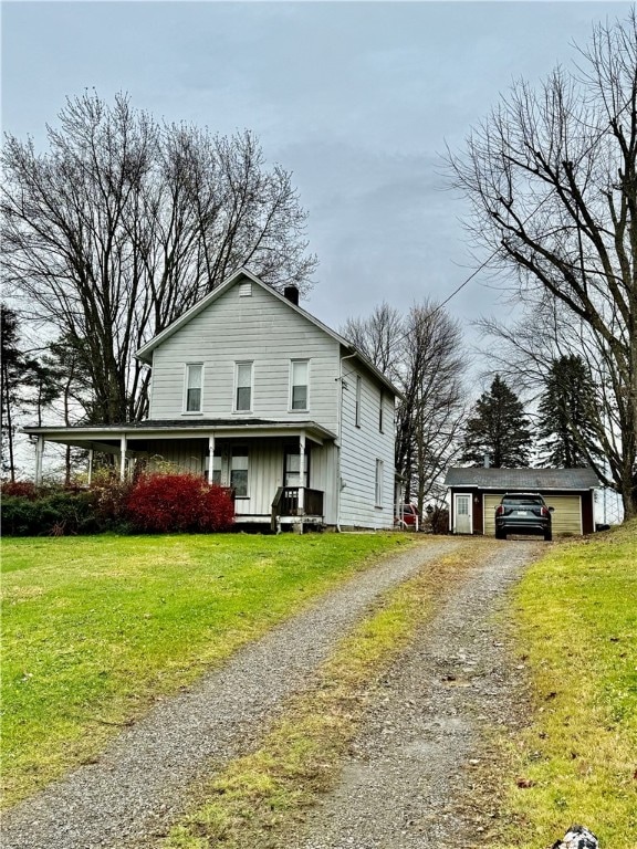 view of front of house featuring a porch and a front yard