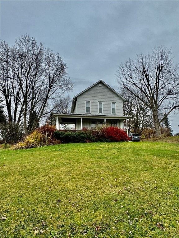 view of home's exterior with a lawn