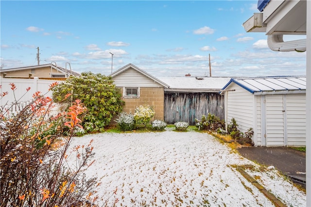 exterior space featuring a storage shed