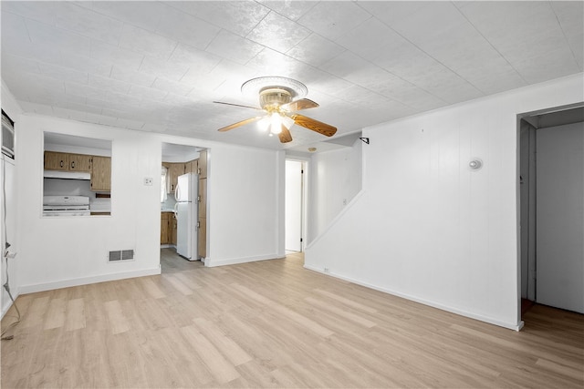 unfurnished living room with ceiling fan and light hardwood / wood-style floors