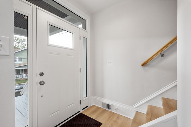 foyer featuring wood-type flooring