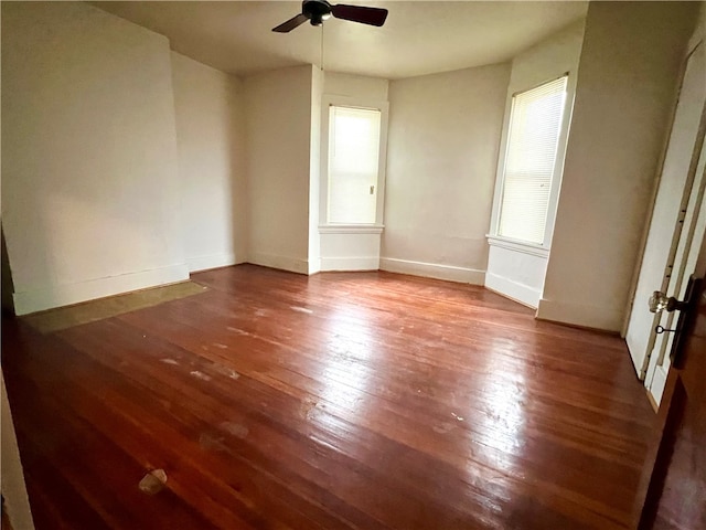 unfurnished room with wood-type flooring and ceiling fan