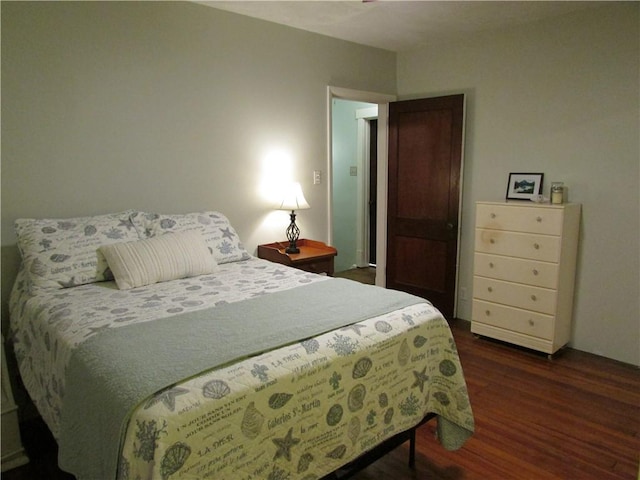 bedroom featuring dark hardwood / wood-style floors