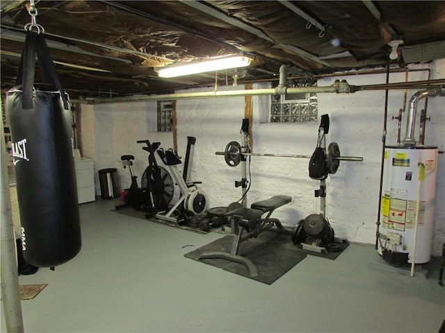 workout room with washer / clothes dryer and gas water heater