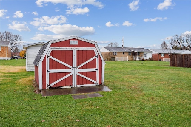 view of outdoor structure with a yard